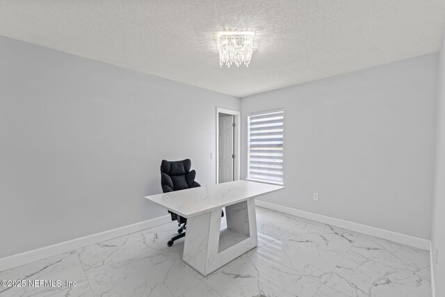 132 Summerhill Cir, Saint Augustine, FL 32086 - unfurnished office with light marble finish flooring, a textured ceiling, and a chandelier