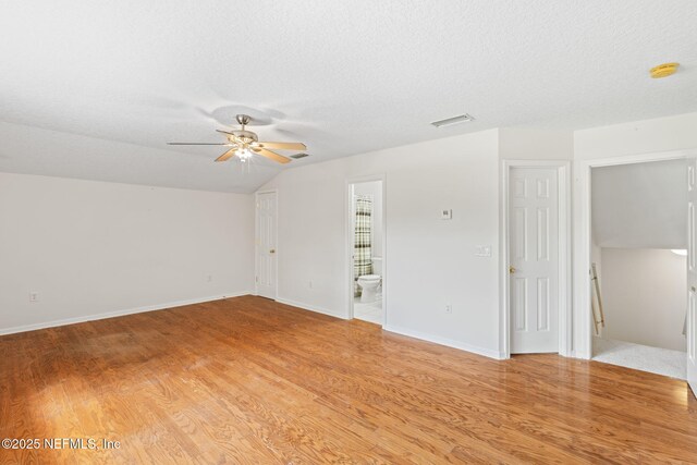 132 Summerhill Cir, Saint Augustine, FL 32086 - spare room featuring light wood-type flooring, ceiling fan, a textured ceiling, and a smoke detector