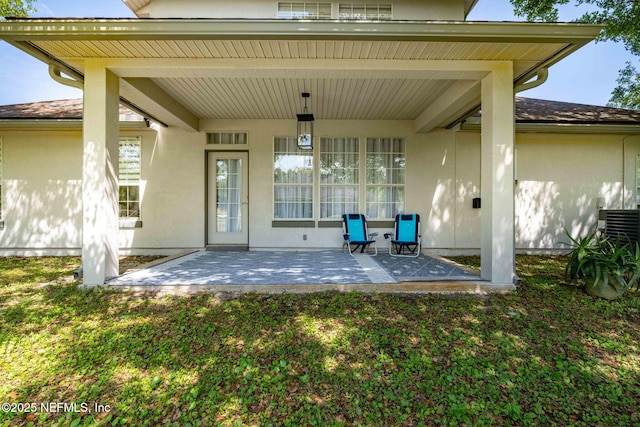 132 Summerhill Cir, Saint Augustine, FL 32086 - back of house featuring a patio area and a yard