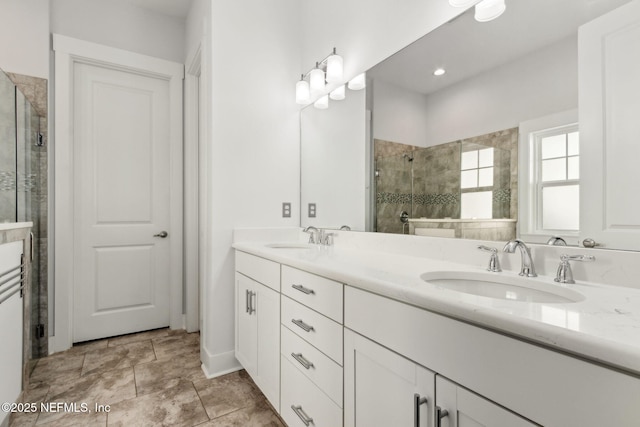 1553 Coastal Oaks Cir, Fernandina Beach, FL 32034 - bathroom with double vanity, a sink, and tiled shower