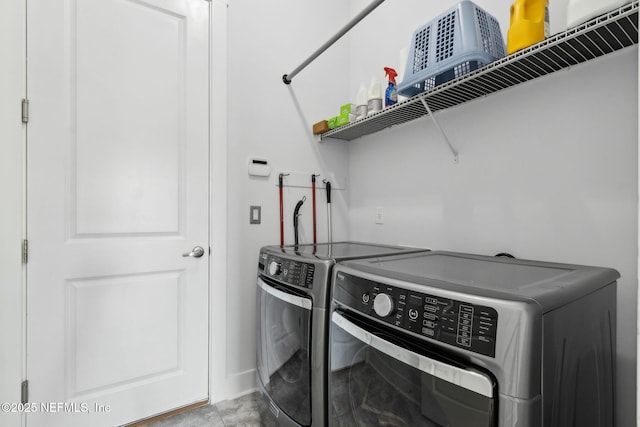 1553 Coastal Oaks Cir, Fernandina Beach, FL 32034 - laundry room with laundry area, baseboards, and washer and dryer