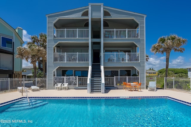 2900 Coastal Hwy # 1, Saint Augustine, FL 32084 - community pool with fence, a patio area, and stairway