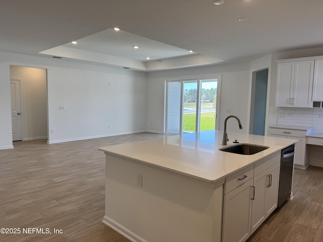 2672 Charmer Ct, Green Cove Springs, FL 32043 - kitchen with recessed lighting, a sink, a raised ceiling, and dishwasher