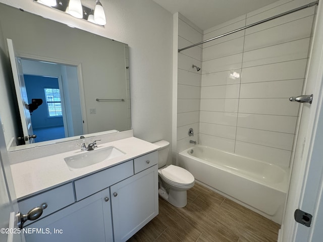 2672 Charmer Ct, Green Cove Springs, FL 32043 - bathroom with vanity, tub / shower combination, toilet, and wood finished floors