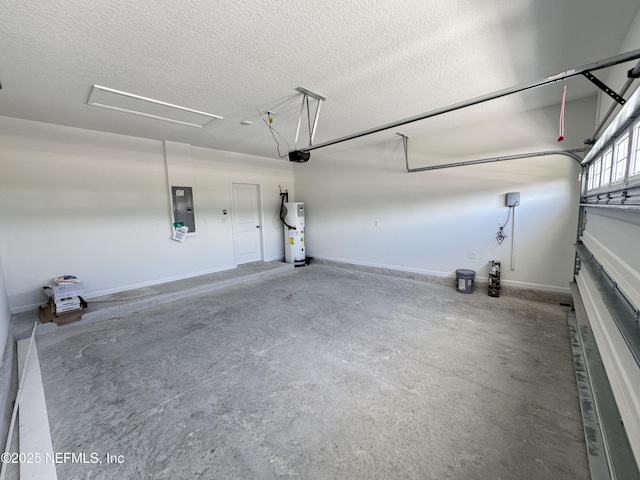 2672 Charmer Ct, Green Cove Springs, FL 32043 - garage featuring water heater, baseboards, a garage door opener, and electric panel