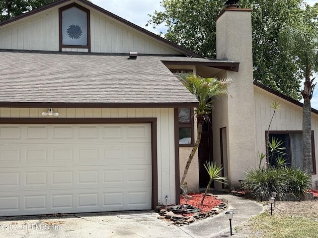4030 Tyndel Creek Pl, Jacksonville, FL 32223 - view of front of property with roof with shingles, a chimney, and concrete driveway