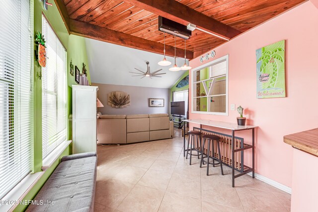 4030 Tyndel Creek Pl, Jacksonville, FL 32223 - kitchen with wooden ceiling, light tile patterned floors, ceiling fan, decorative light fixtures, and baseboards