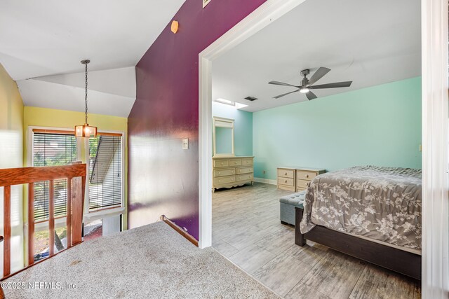 4030 Tyndel Creek Pl, Jacksonville, FL 32223 - bedroom with vaulted ceiling, wood finished floors, and baseboards