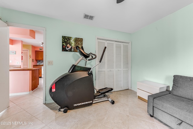 4030 Tyndel Creek Pl, Jacksonville, FL 32223 - exercise area with light tile patterned flooring and baseboards