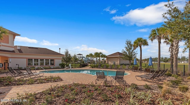 4323 Warm Springs Way, Middleburg, FL 32068 - community pool featuring a patio area and fence
