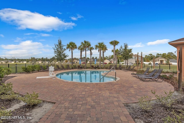4323 Warm Springs Way, Middleburg, FL 32068 - community pool with a patio area and fence