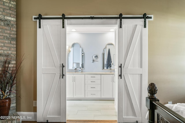 bathroom with double vanity and a sink