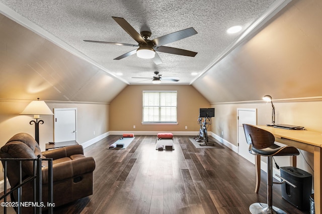 bonus room featuring baseboards, a ceiling fan, dark wood finished floors, and a textured ceiling