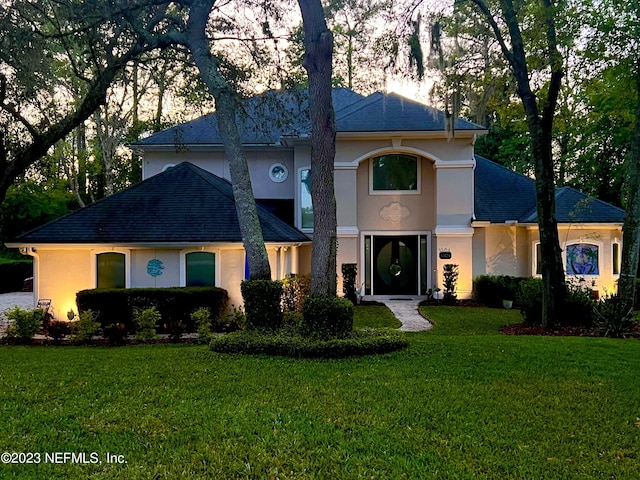 1304 Hideaway Dr S, Saint Johns, FL 32259 - view of front of home featuring stucco siding and a front yard