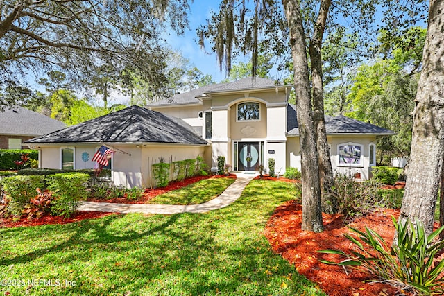 1304 Hideaway Dr S, Saint Johns, FL 32259 - view of front of house with stucco siding and a front yard