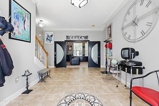 1304 Hideaway Dr S, Saint Johns, FL 32259 - foyer with crown molding, stairs, tile patterned flooring, and a textured ceiling
