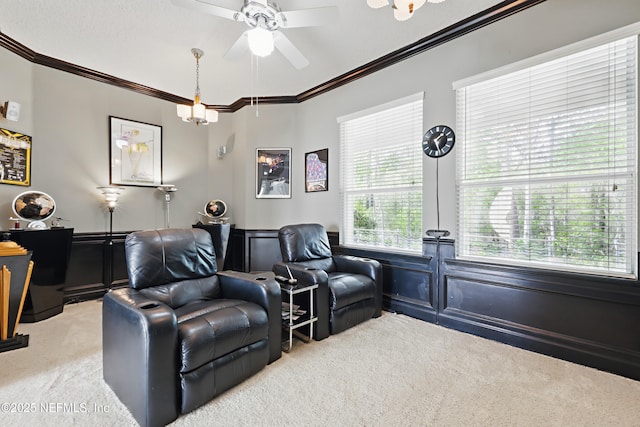 1304 Hideaway Dr S, Saint Johns, FL 32259 - cinema featuring light carpet, ornamental molding, ceiling fan, wainscoting, and a decorative wall