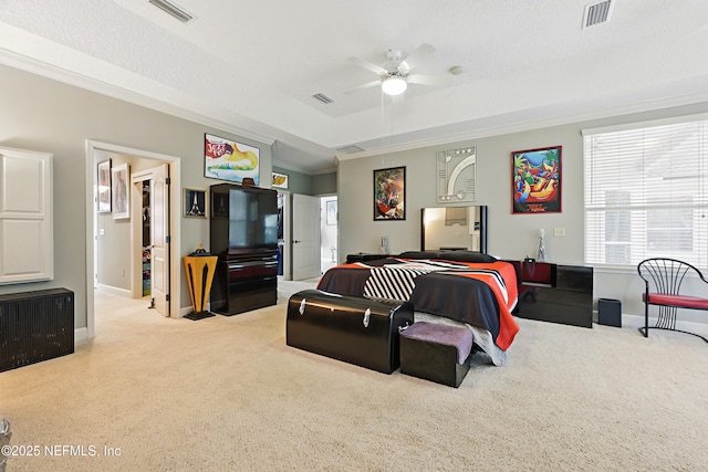1304 Hideaway Dr S, Saint Johns, FL 32259 - carpeted bedroom featuring crown molding, a tray ceiling, and a ceiling fan