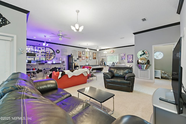 1304 Hideaway Dr S, Saint Johns, FL 32259 - living area with crown molding, carpet floors, a chandelier, and ceiling fan