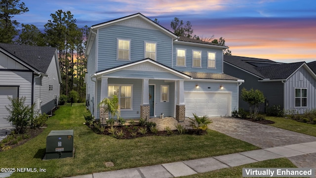 201 Bridgeton St, Saint Johns, FL 32259 - traditional-style house featuring covered porch, a garage, driveway, and a front lawn