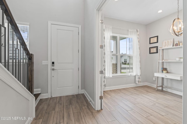201 Bridgeton St, Saint Johns, FL 32259 - foyer entrance with baseboards, stairs, wood finished floors, and a wealth of natural light