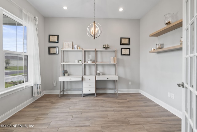 201 Bridgeton St, Saint Johns, FL 32259 - home office featuring baseboards, recessed lighting, light wood-style flooring, and a notable chandelier