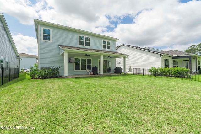 201 Bridgeton St, Saint Johns, FL 32259 - rear view of house featuring a fenced backyard, a ceiling fan, and a lawn
