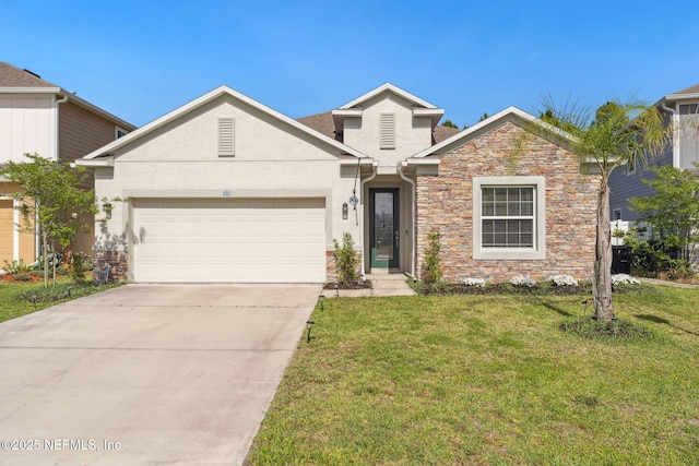 120 Oakleaf Way, Palm Coast, FL 32137 - traditional-style home with a front yard, concrete driveway, an attached garage, stone siding, and stucco siding