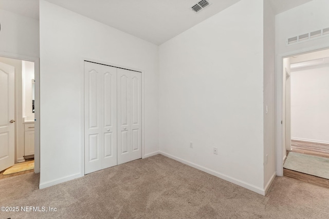120 Oakleaf Way, Palm Coast, FL 32137 - unfurnished bedroom featuring carpet floors and visible vents