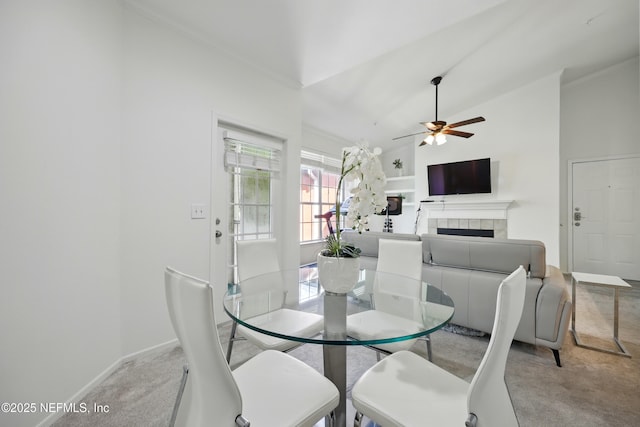 150 Veracruz Dr Unit 537, Ponte Vedra Beach, FL 32082 - dining room featuring high vaulted ceiling, a fireplace, ceiling fan, light carpet, and baseboards