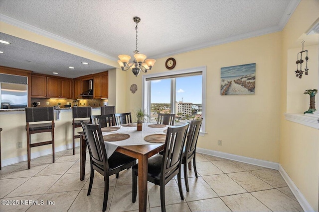 dining room with a textured ceiling, crown molding, a chandelier, light tile patterned flooring, and recessed lighting
