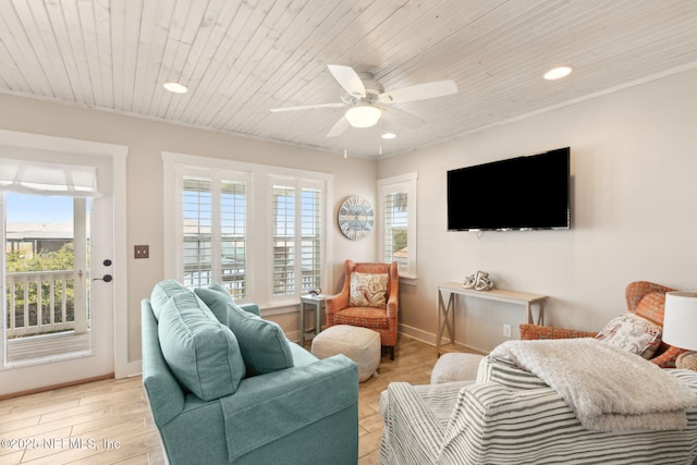 living room with recessed lighting, ceiling fan, and a wealth of natural light