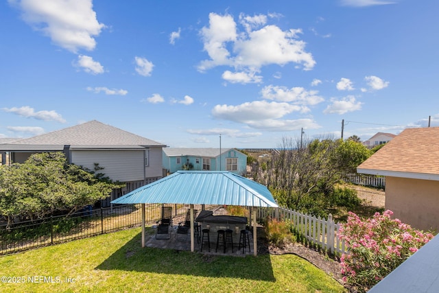 exterior space with a fenced backyard and a patio area