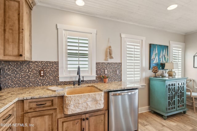 kitchen featuring decorative backsplash, stainless steel dishwasher, light stone countertops, light wood-type flooring, and recessed lighting