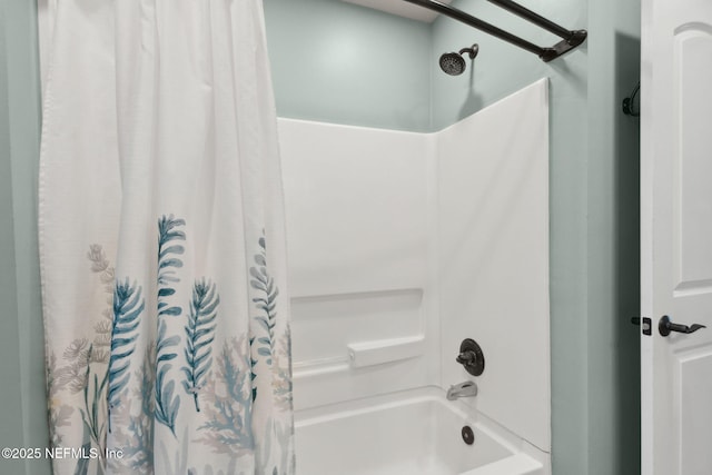 bathroom with shower / bath combo