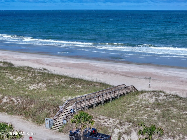 property view of water featuring a beach view