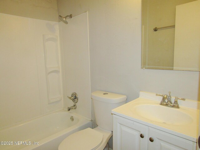 full bathroom with toilet, bathing tub / shower combination, and vanity