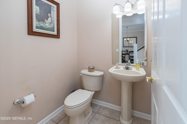 1296 Copper Creek Dr, Macclenny, FL 32063 - half bathroom with toilet, baseboards, tile patterned floors, and an inviting chandelier