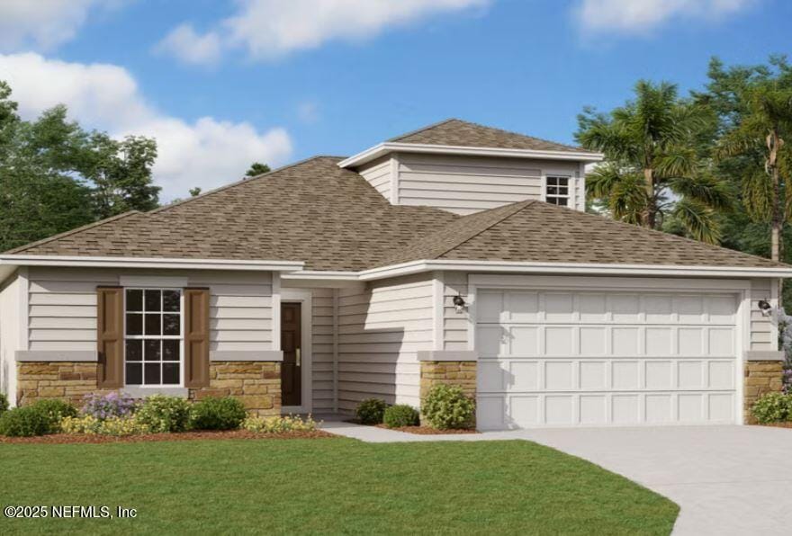 3363 Golden Eye Dr, Orange Park, FL 32065 - view of front facade featuring a shingled roof, stone siding, a garage, a front yard, and concrete driveway