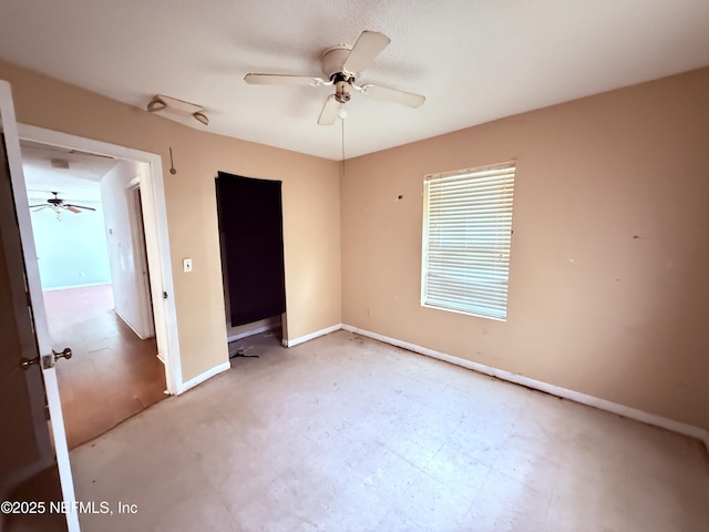 4503 Royal St, Palatka, FL 32177 - unfurnished bedroom with baseboards and ceiling fan