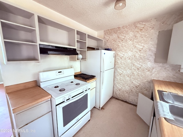 4503 Royal St, Palatka, FL 32177 - kitchen with open shelves, white appliances, light countertops, a textured ceiling, and under cabinet range hood