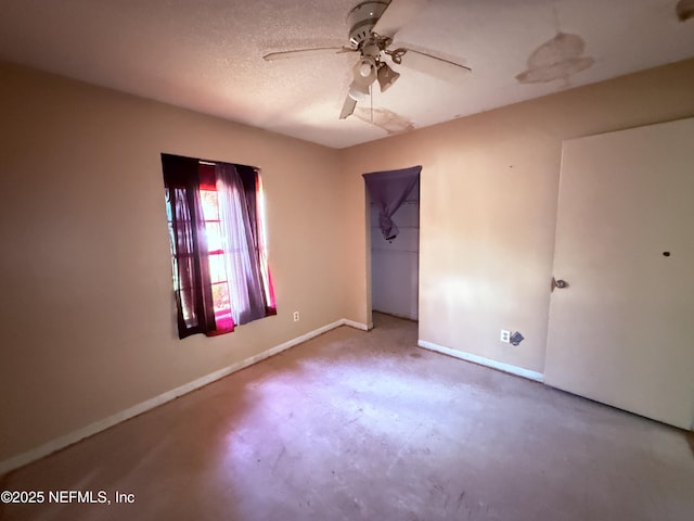 4503 Royal St, Palatka, FL 32177 - spare room featuring baseboards, a ceiling fan, and a textured ceiling