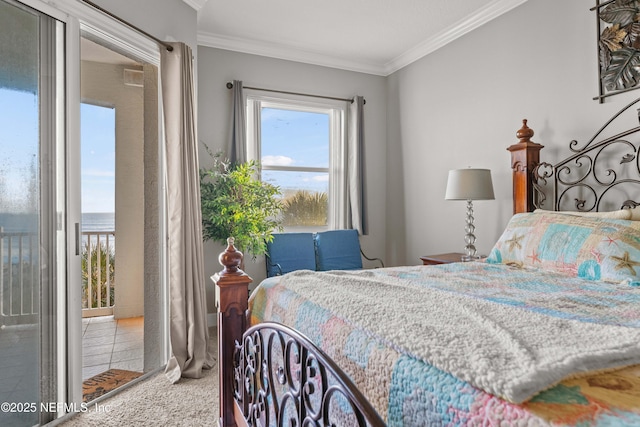 bedroom with multiple windows, crown molding, access to outside, carpet floors, and a water view