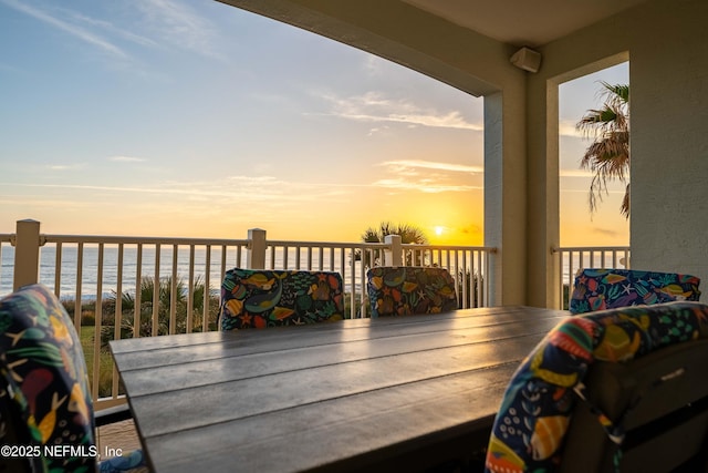 balcony featuring a water view