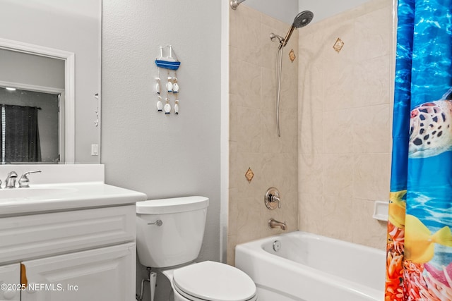 full bath featuring shower / bathtub combination with curtain, vanity, and toilet