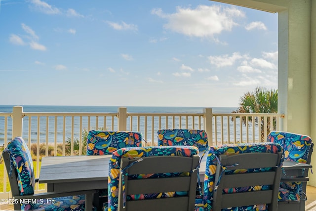 wooden terrace with a water view