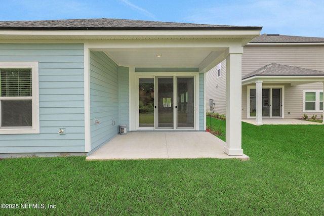 37 Bird Watch Ct, Saint Augustine, FL 32092 - back of property with a patio and a lawn