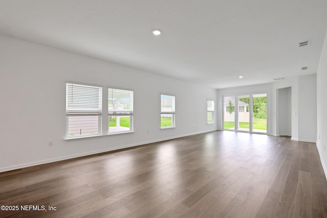 37 Bird Watch Ct, Saint Augustine, FL 32092 - spare room with wood finished floors, baseboards, and recessed lighting