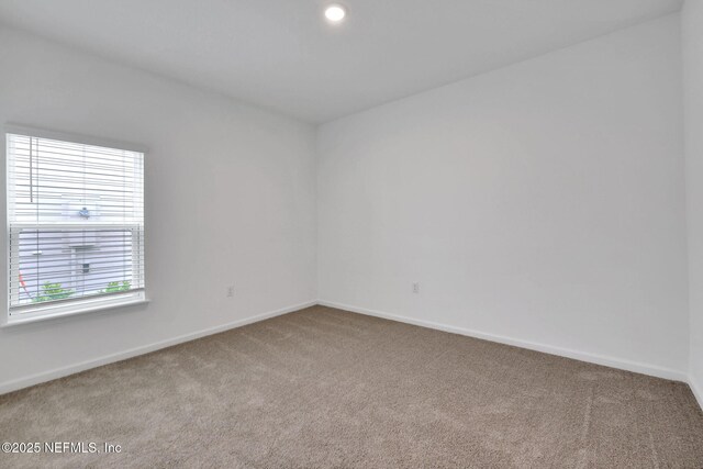 37 Bird Watch Ct, Saint Augustine, FL 32092 - empty room with carpet flooring and baseboards