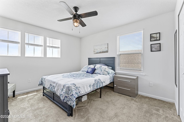 513 Sandstone Dr, Saint Augustine, FL 32086 - carpeted bedroom with baseboards and a ceiling fan